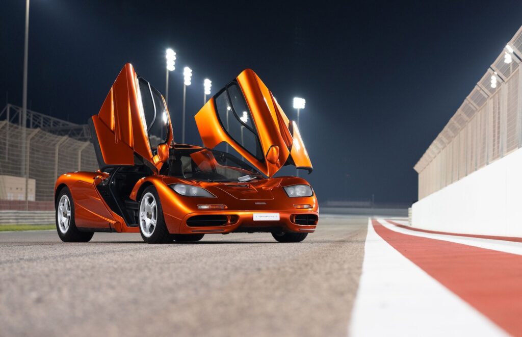 Front three-quarter view of McLaren F1 with dihedral doors raised