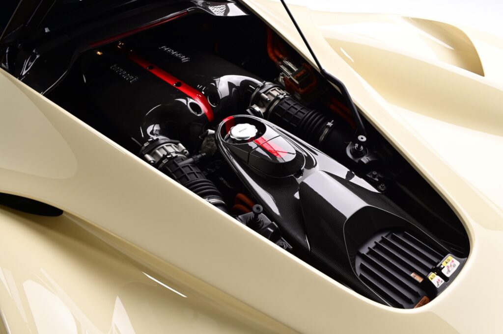 Ferrari LaFerrari hybrid V12 engine bay with rear body panels open.
