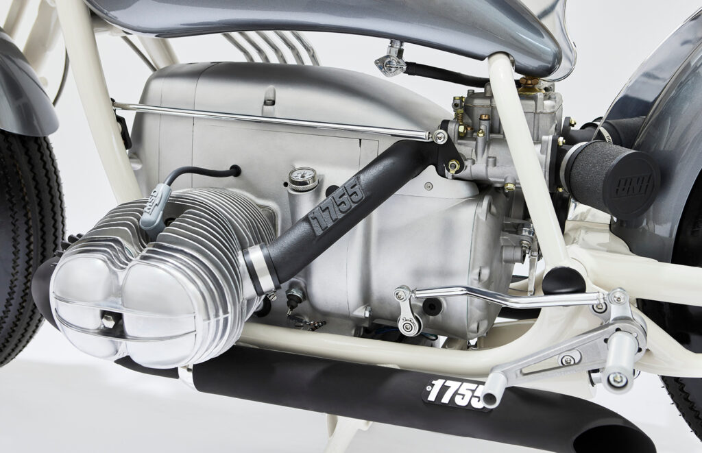 Close-up of the custom BMW R75/5 boxer engine showing the 1755 intake manifold and Weber carburetor conversion