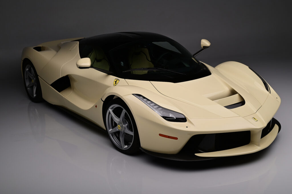 Ferrari LaFerrari front three-quarter view with reflective studio floor.