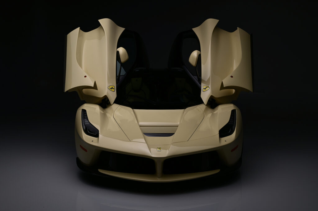 Front view of Ferrari LaFerrari with doors open.