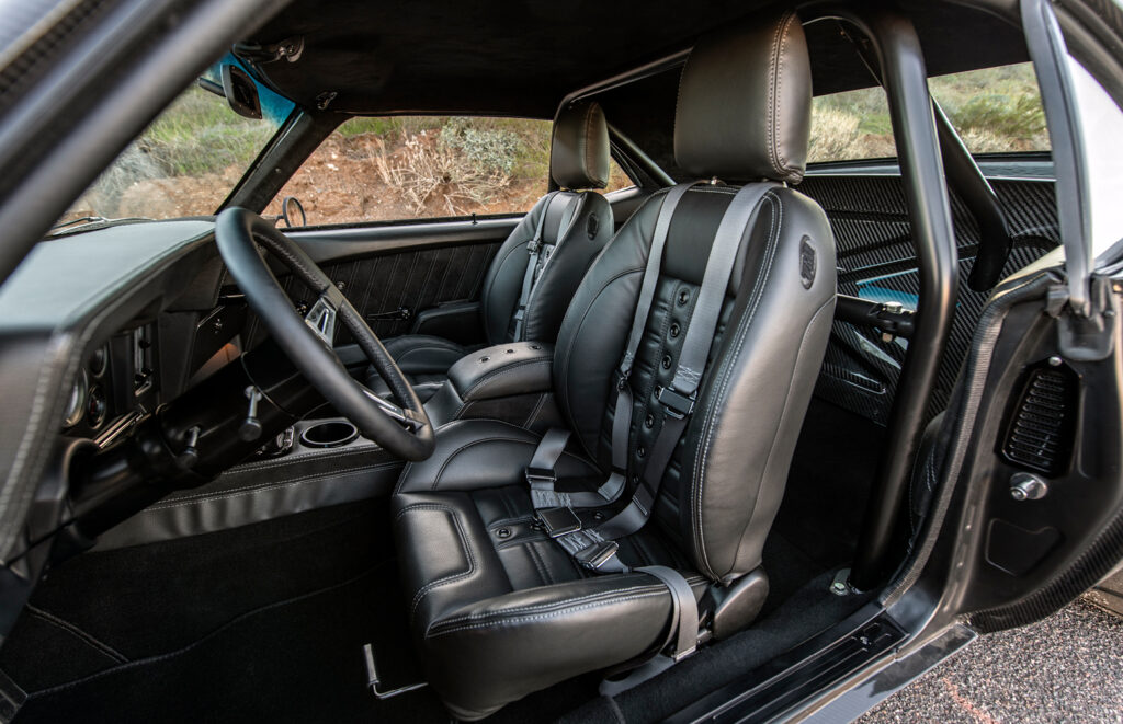 Custom black leather interior with harnesses in Finale Speed 1969 Camaro