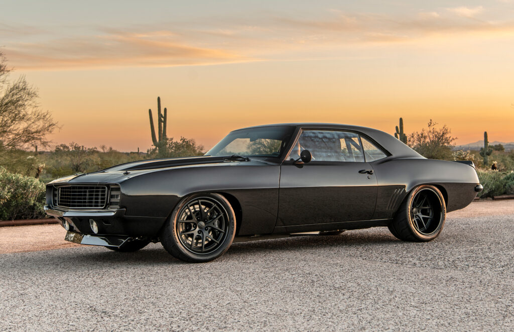 Side profile of carbon fiber 1969 Camaro by Finale Speed at sunset