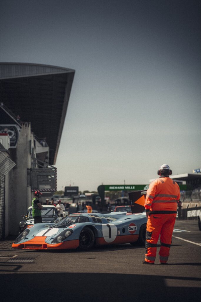 Gulf-liveried prototype race car in the pit lane at Peter Auto Classic Le Mans