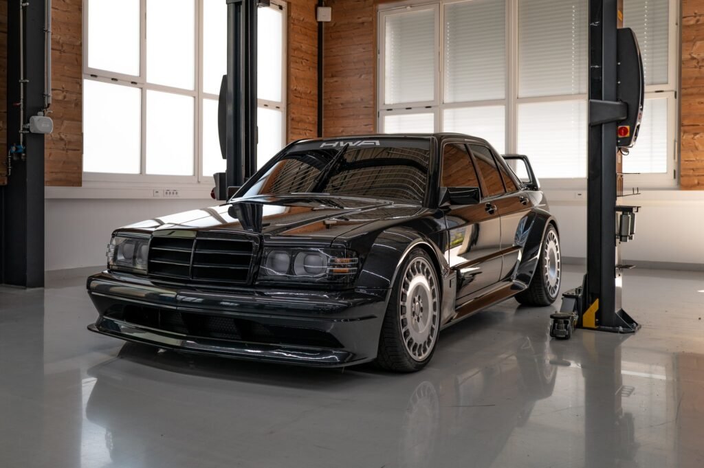 Black HWA EVO front three-quarter studio view