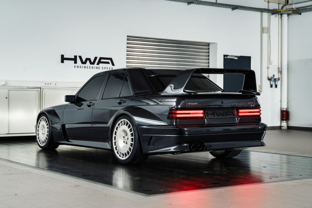 Black HWA EVO rear three-quarter studio view