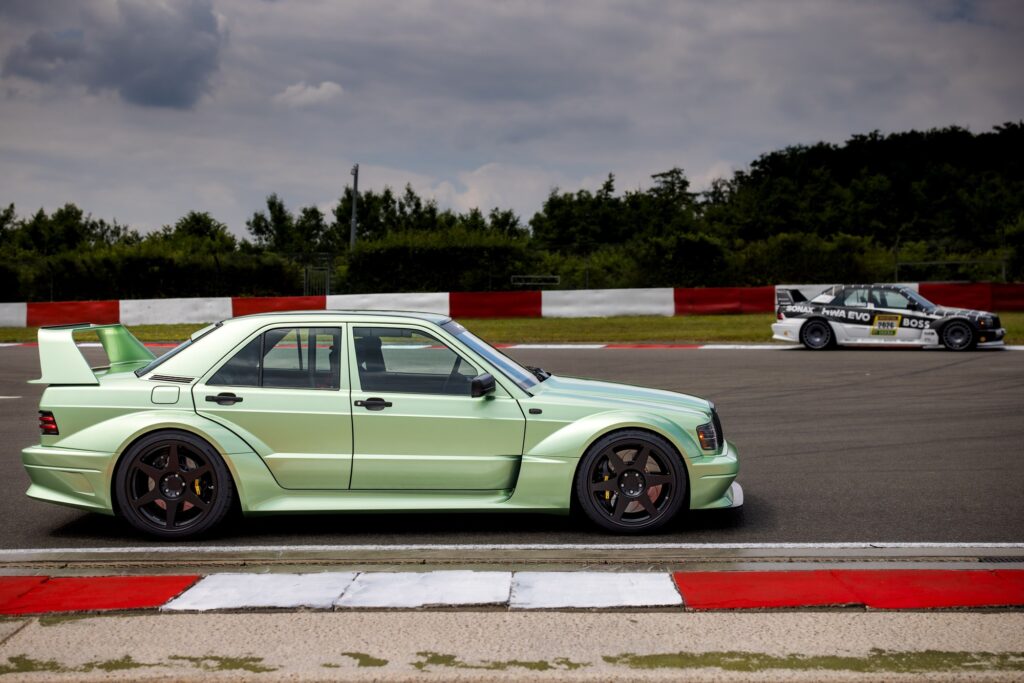 HWA EVO prototype side profile at race circuit