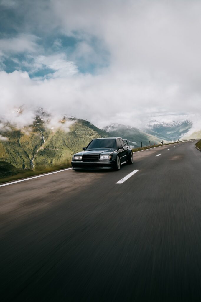 HWA EVO driving on road front three-quarter vertical frame