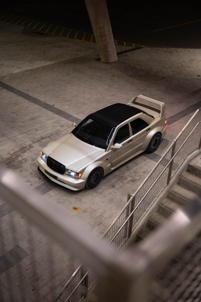 Silver HWA EVO overhead front three-quarter night view