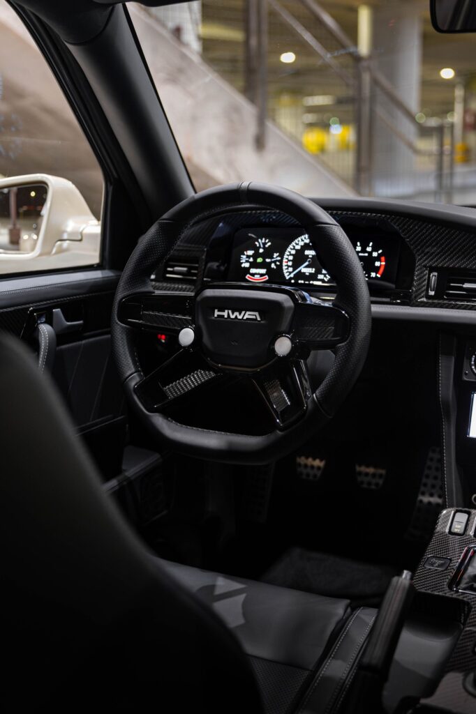 HWA EVO steering wheel and digital instrument cluster interior