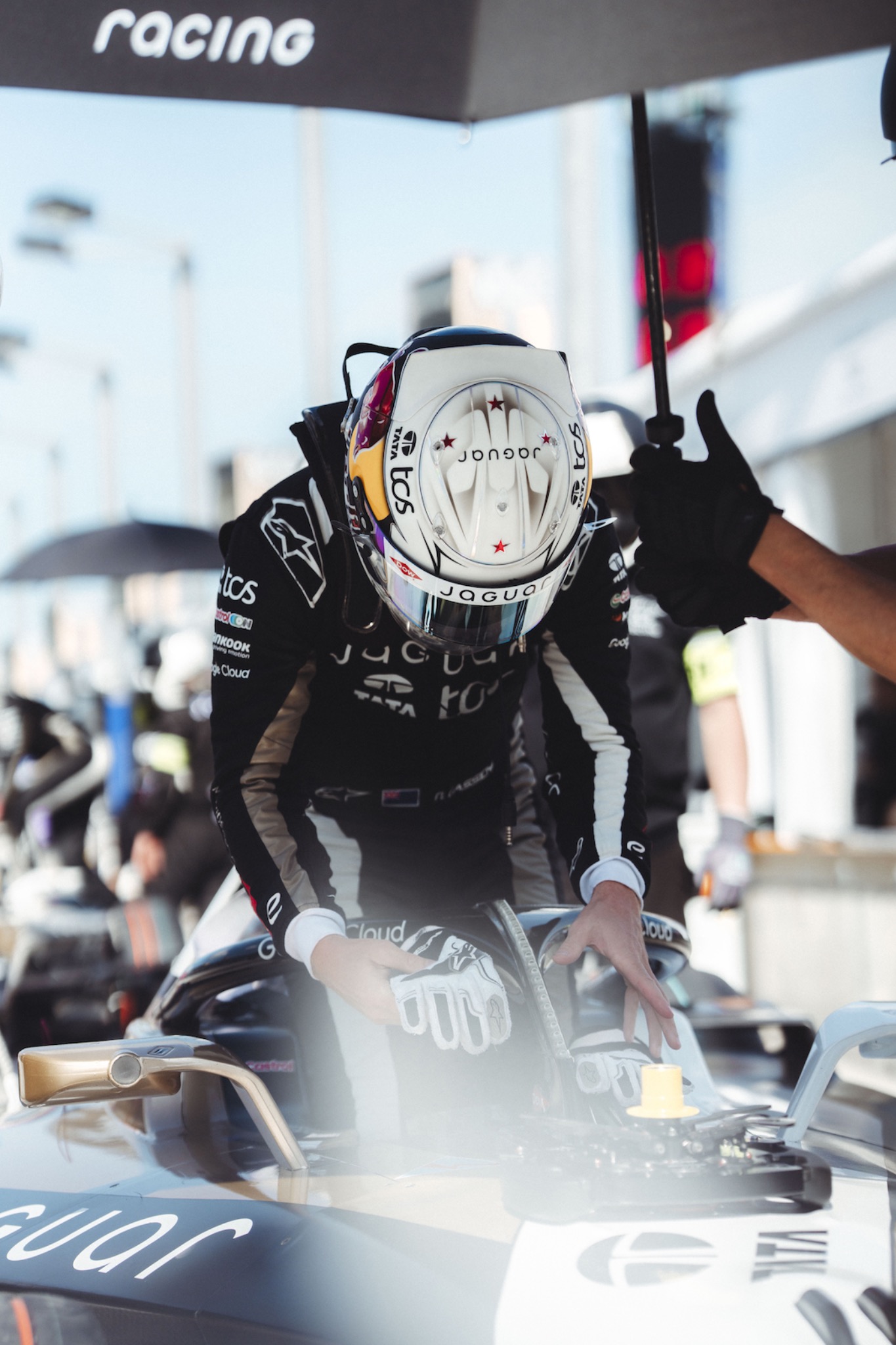 Close-up of Nick Cassidy in Jaguar Formula E car cockpit 2025