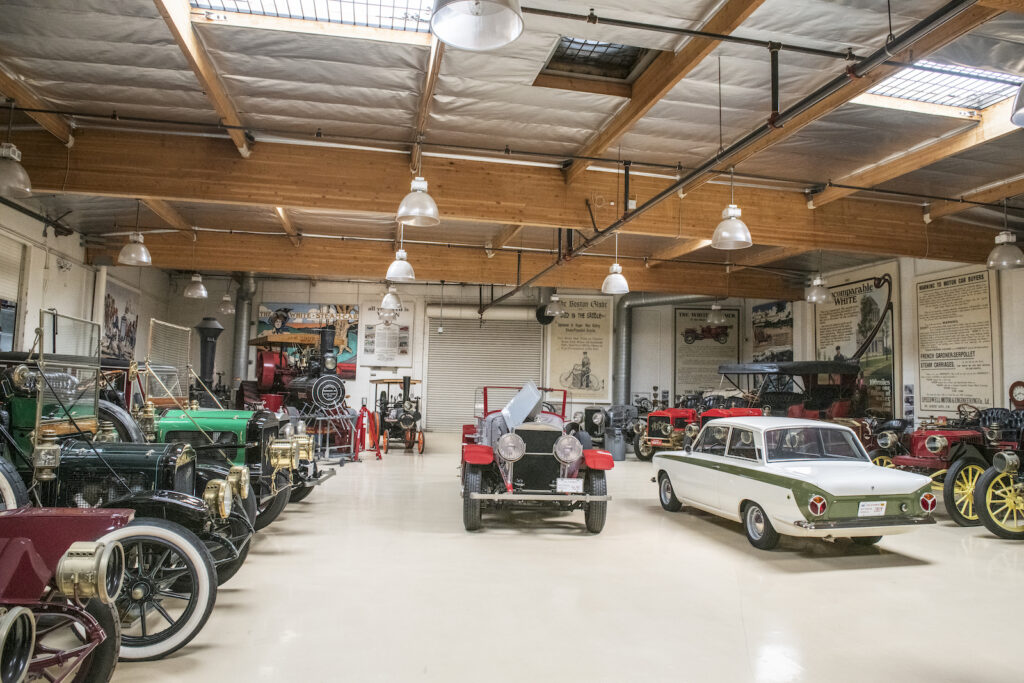 Antique car display inside Jay Leno garage