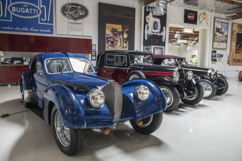 Blue Bugatti classic car front view in Jay Leno garage