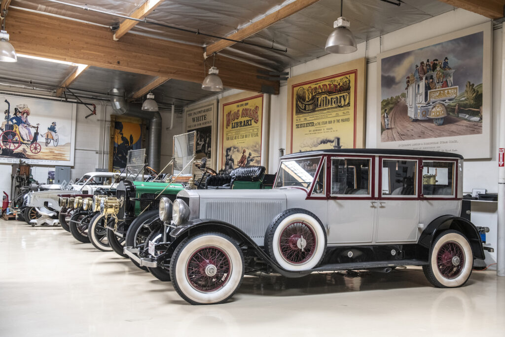 Row of classic luxury cars in Jay Leno garage