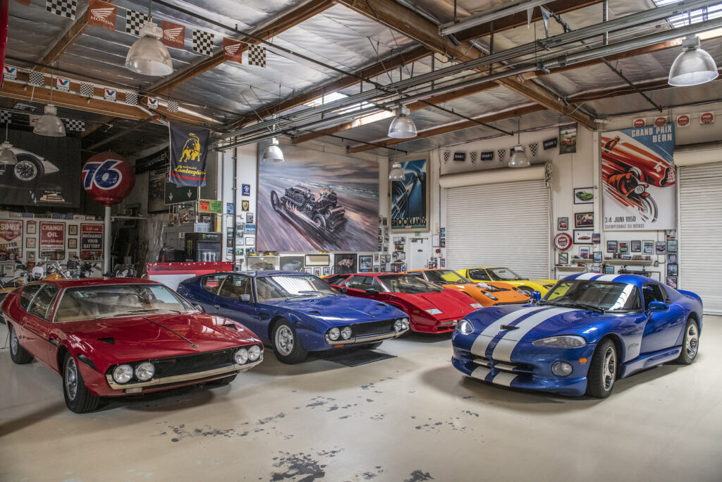 Classic sports cars wide view in Jay Leno garage