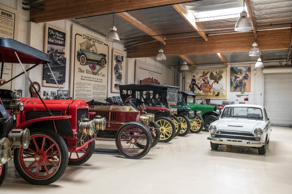 Early automobile display in Jay Leno garage
