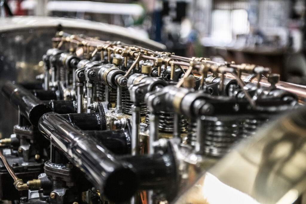Vintage engine detail close up in Jay Leno garage