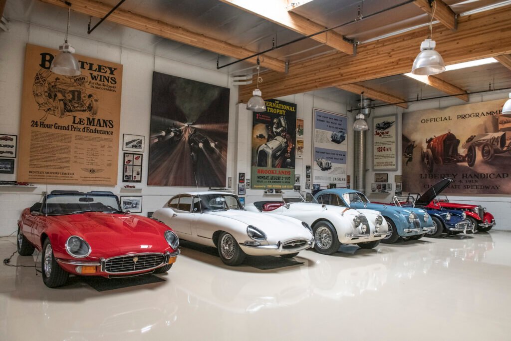 Row of European sports cars in Jay Leno garage