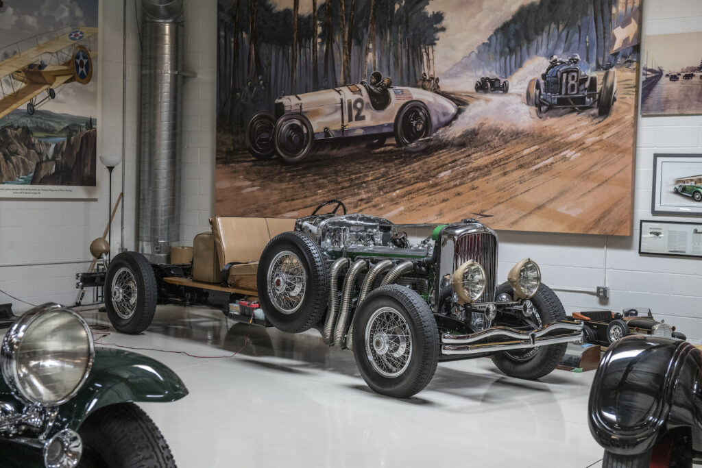 Vintage car display in Jay Leno garage