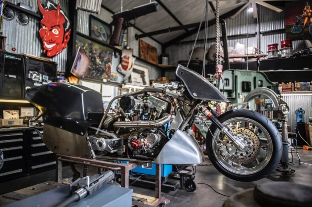 Custom performance motorcycle inside Jesse James’ fabrication shop