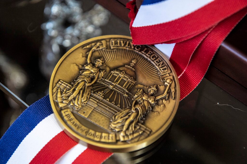 Close-up of a gold medal in Mario Andretti’s collection