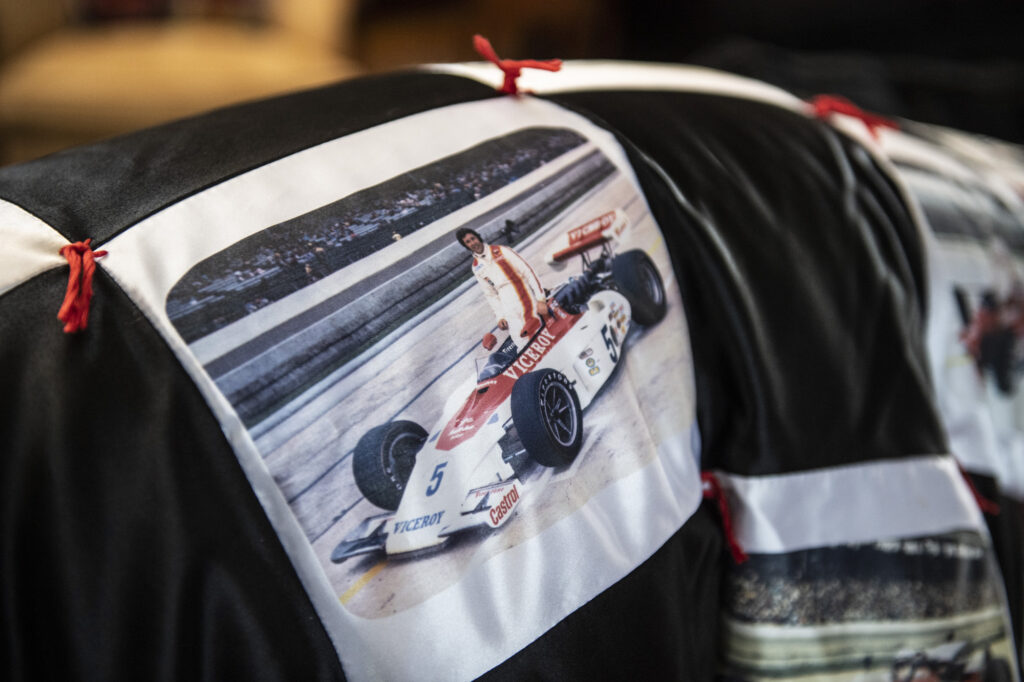 Detail of racing patches on Mario Andretti’s jacket