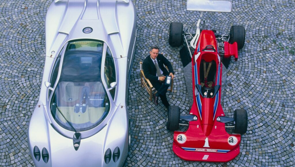 Pagani Zonda beside Formula race car overhead view