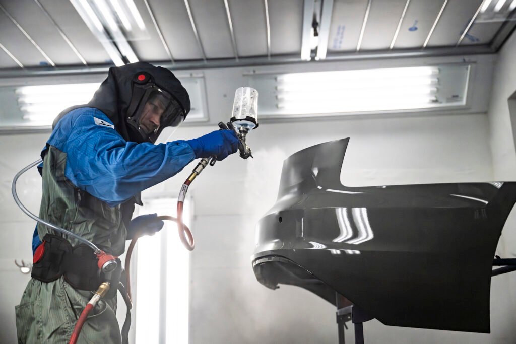 Ducktail spoiler being painted at European Autoworks