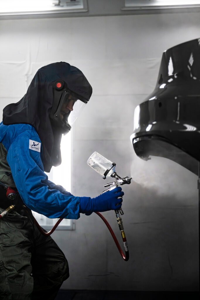 Ducktail spoiler paint process detail