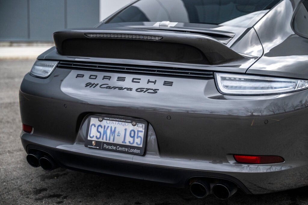 Porsche 911 Carrera GTS rear angle outdoors