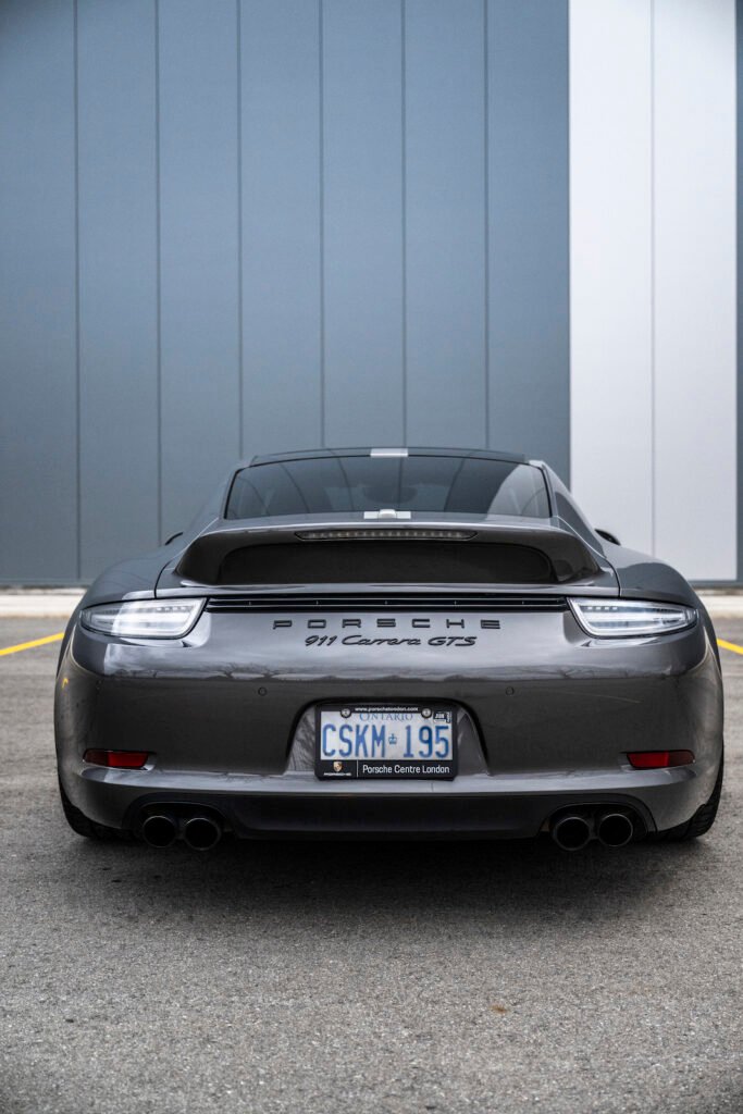 Rear view ducktail detail on Porsche 911 Carrera GTS