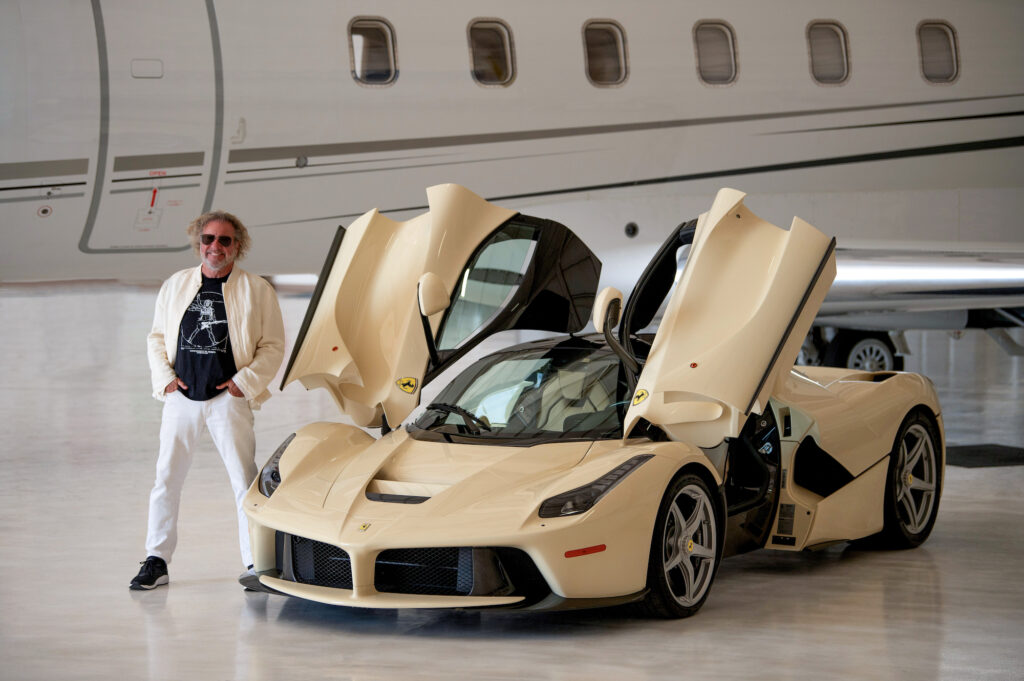 Sammy Hagar Ferrari sale: Sammy standing next to his Ferrari LaFerrari.