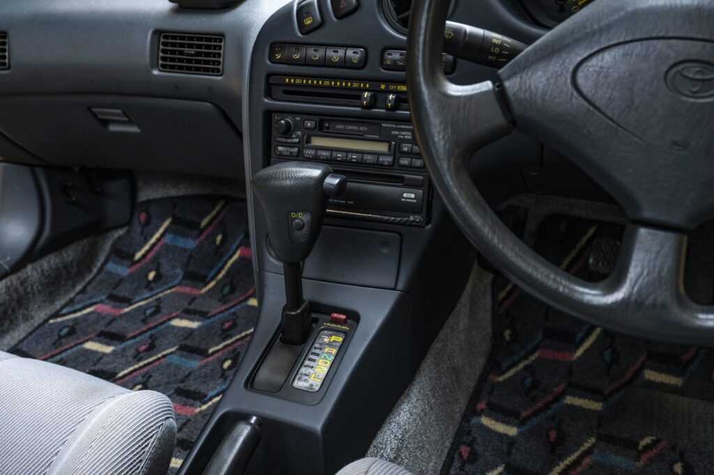 Automatic gear shifter and centre console detail in right-hand-drive Toyota Sera interior