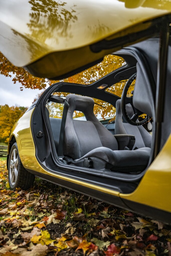 Interior view through open butterfly door of Toyota Sera