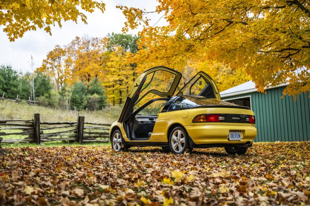 Toyota Sera rear three-quarter view with butterfly doors raised