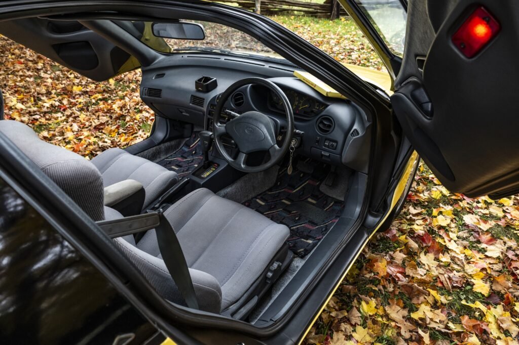 Right-hand-drive Toyota Sera interior with butterfly door open