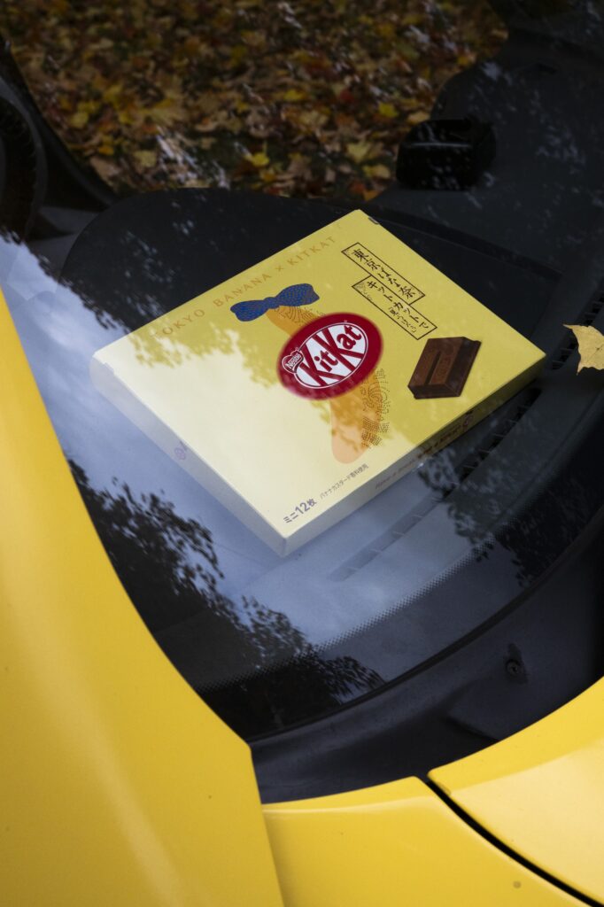 Yellow box resting on Toyota Sera curved glass rear hatch